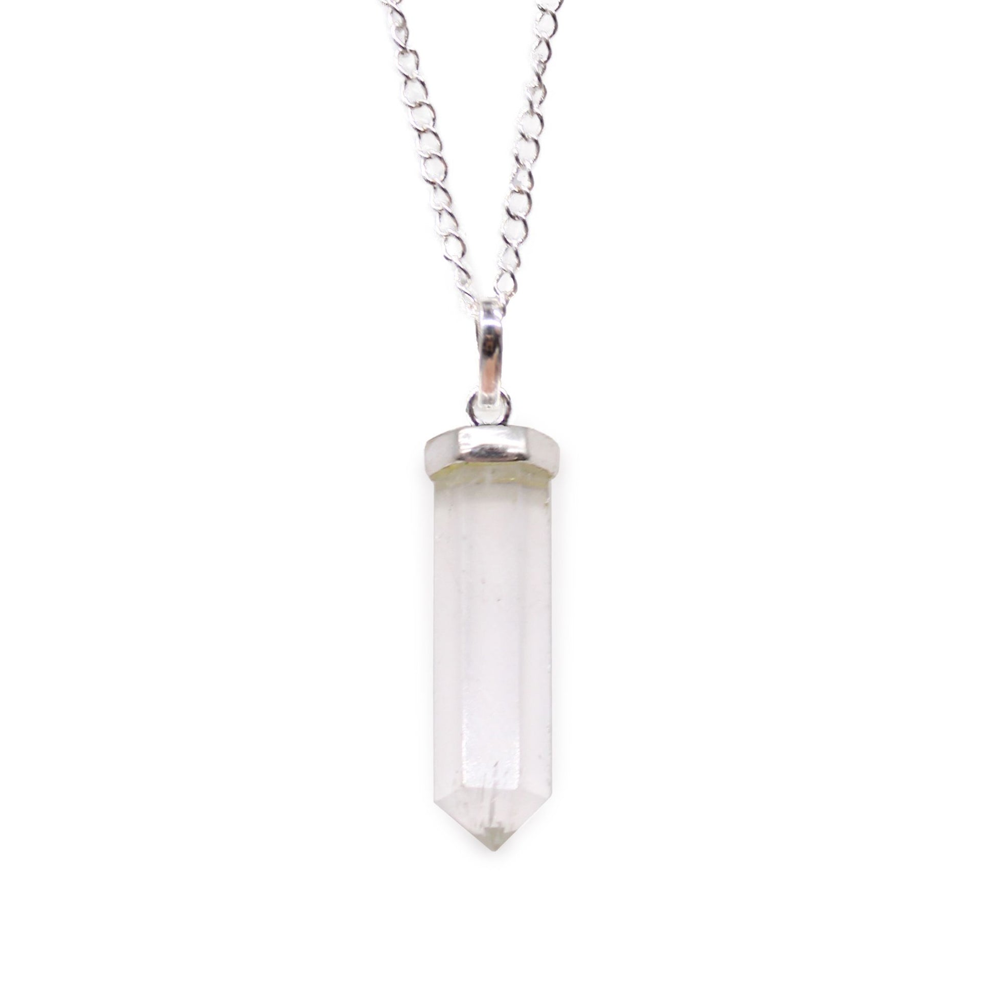 Clear rock quartz gemstone carved into a classic hexagonal point pendant with a silver-toned metal bale.
