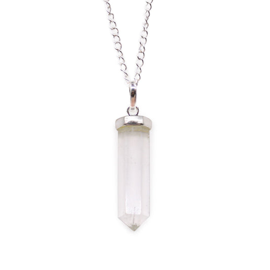 Clear rock quartz gemstone carved into a classic hexagonal point pendant with a silver-toned metal bale.