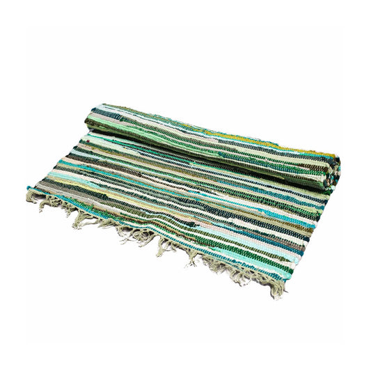 A small rectangular hand-woven rag rug featuring various shades of natural green fabric strips.