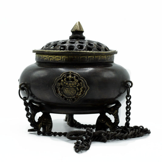 Large ornate brass hanging incense burner pot featuring intricate carvings of four celestial symbols and hanging chains.