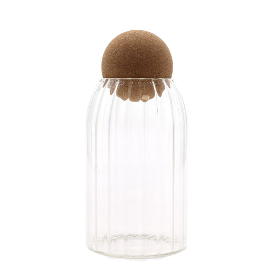 Clear 15cm glass jar with vertical ribbed texture and a spherical cork ball lid on a plain background.
