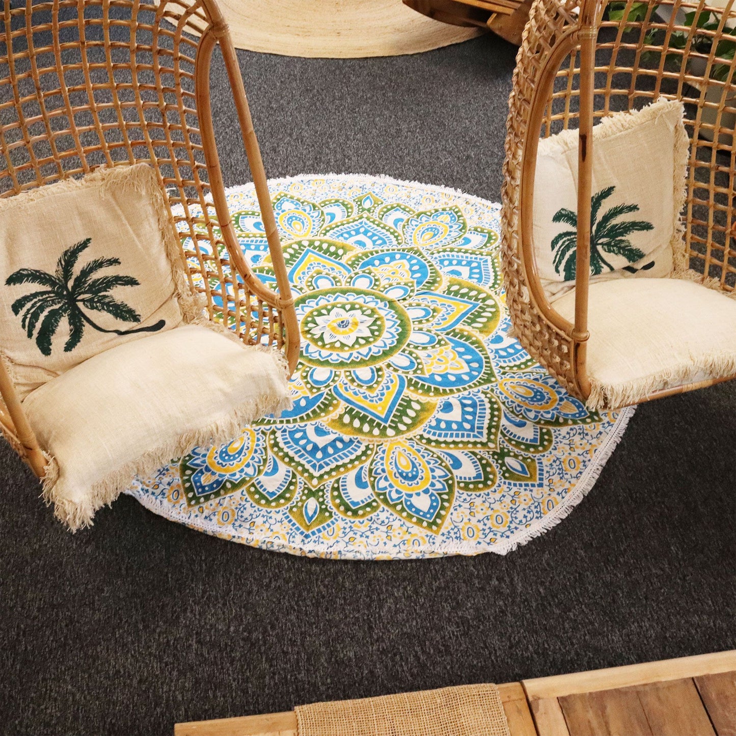 Large circular cotton wall hanging featuring a vibrant yellow and blue mandala design with intricate layered petals.