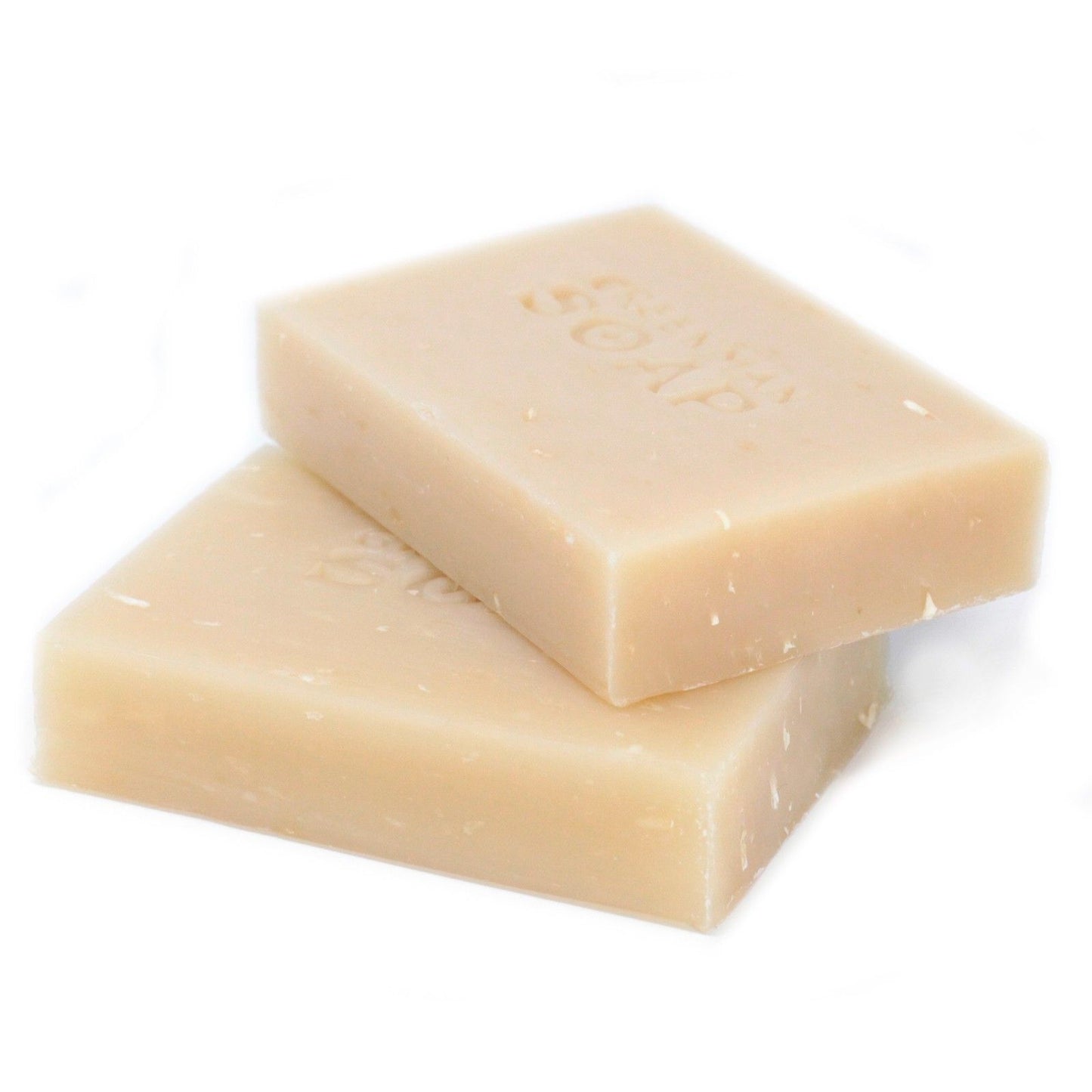 Handcrafted soap slice with real dried coconut flakes and a fresh tropical texture.