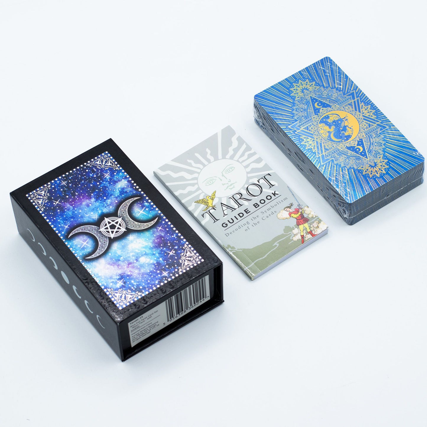 Celestial tarot cards with shimmering blue foil moon face designs and cosmic star patterns.