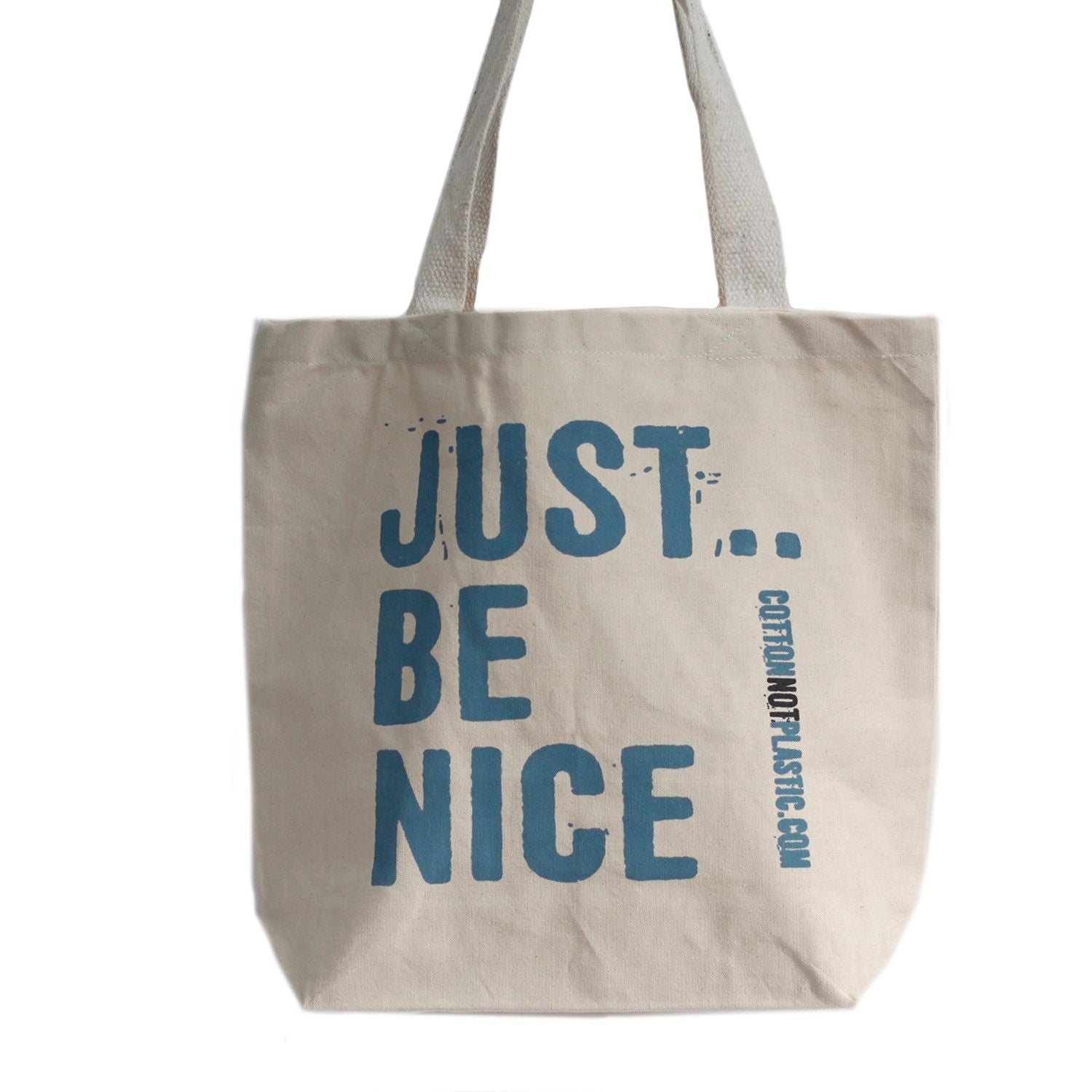 Eco-friendly cotton tote bag featuring the words Just Be Nice in a simple, stylish font.