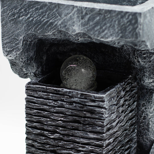 Large grey stone-effect tabletop water feature with a spinning crystal ball illuminated by colour-changing LED lights.