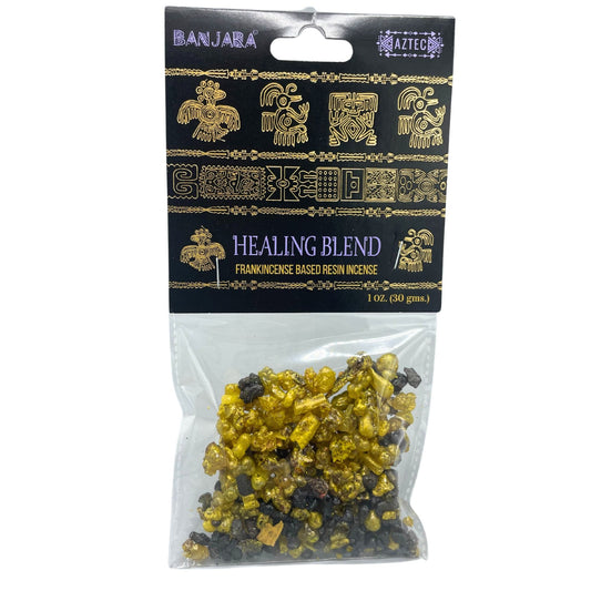 Handcrafted aromatic tree resin pieces in a small pile, showing natural textures and earthy tones.