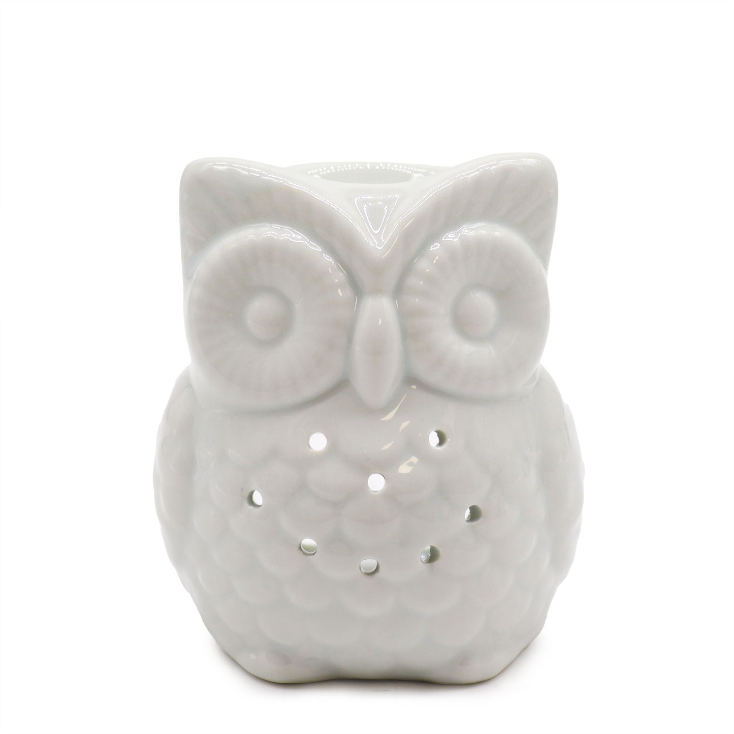 Elegant tall white ceramic oil burner featuring a decorative owl cutout design on a smooth glazed surface.