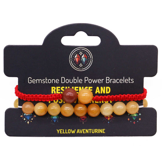 Two strands of polished yellow aventurine gemstone beads on a stretch bracelet, showing natural sunny gold tones.