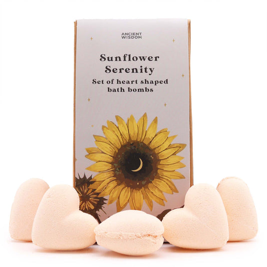 Beautifully packaged gift box containing heart-shaped bath bombs with a vibrant yellow sunflower design.