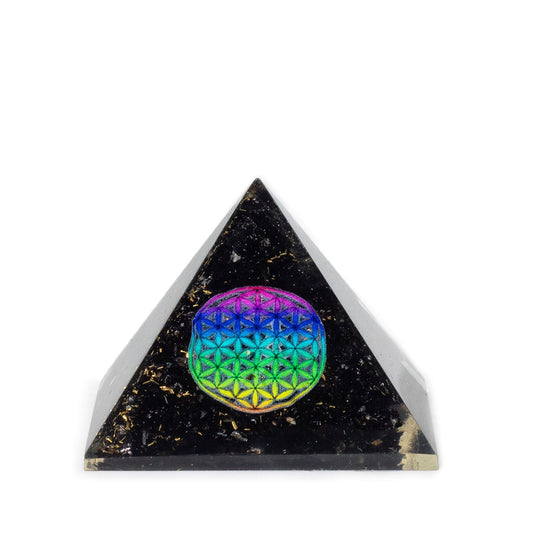 Small resin orgonite pyramid containing black tourmaline chips and a gold-tone Flower of Life sacred geometry symbol.