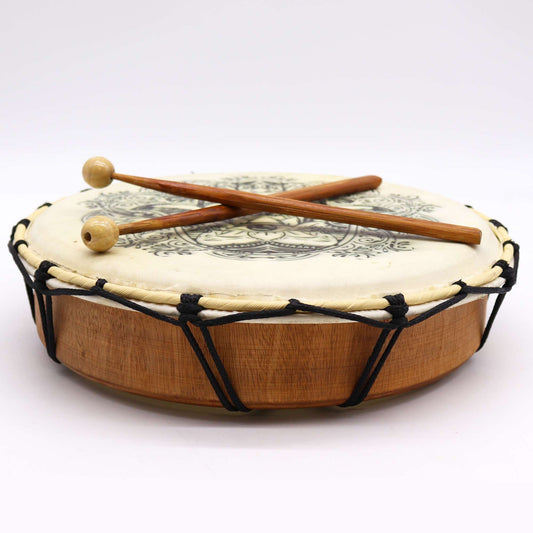 Handcrafted 30cm shamanic drum featuring a detailed Hamsa symbol on the drumhead, shown with two wooden drumsticks.
