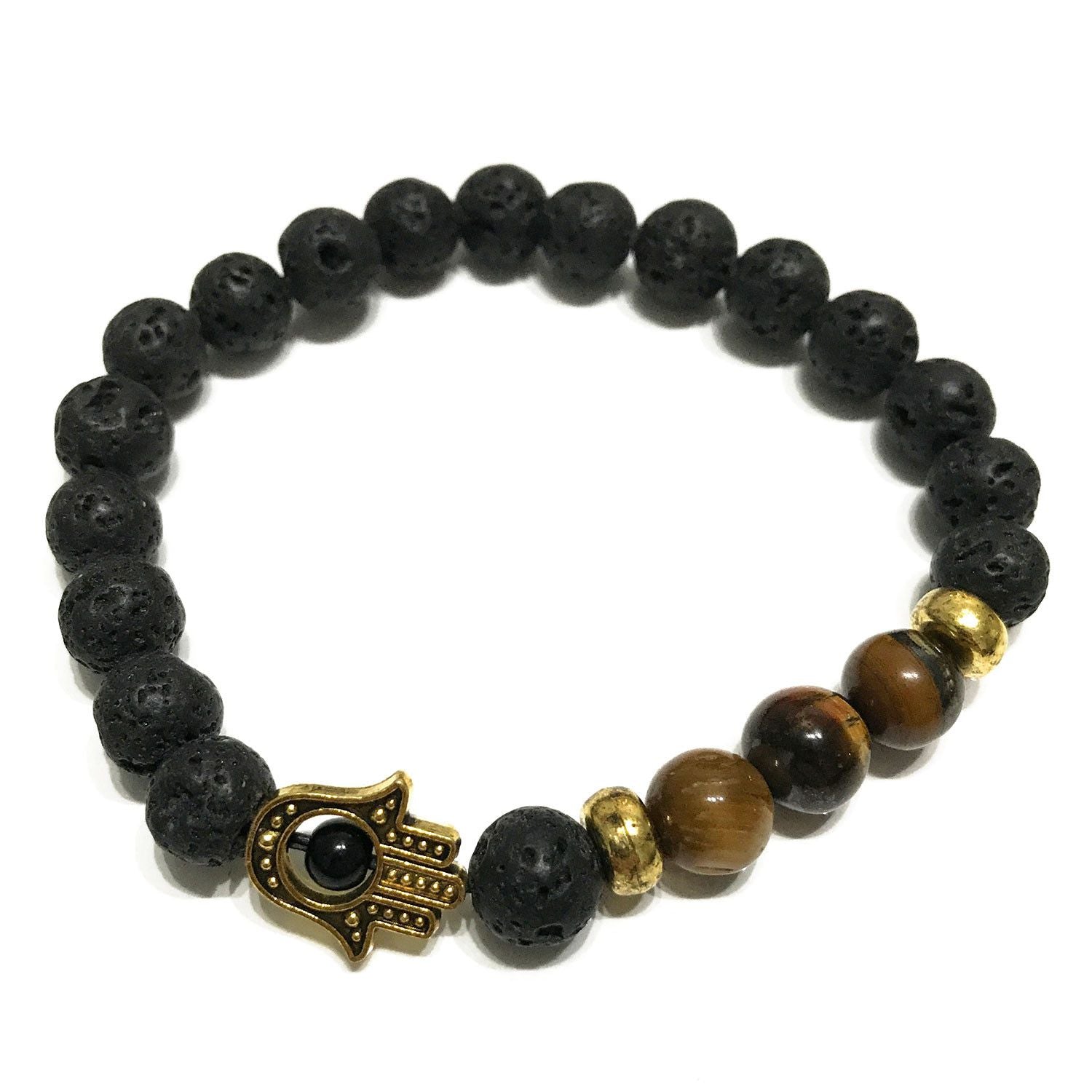 Lava stone bracelet featuring brown tiger eye beads and a silver-toned Hamsa hand charm on a dark background.