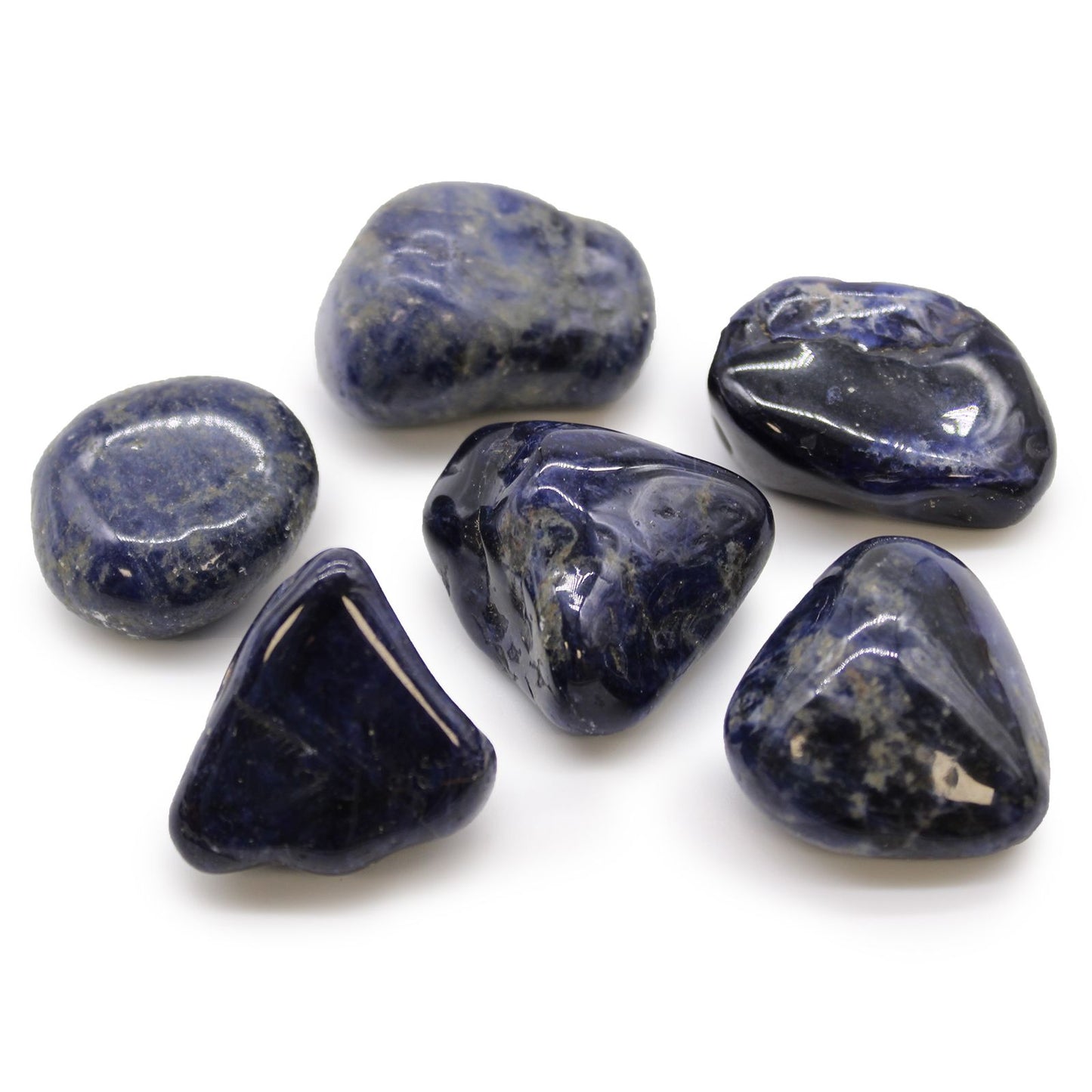 Smooth, large royal blue sodalite tumble stones with characteristic white calcite veining and a polished finish.