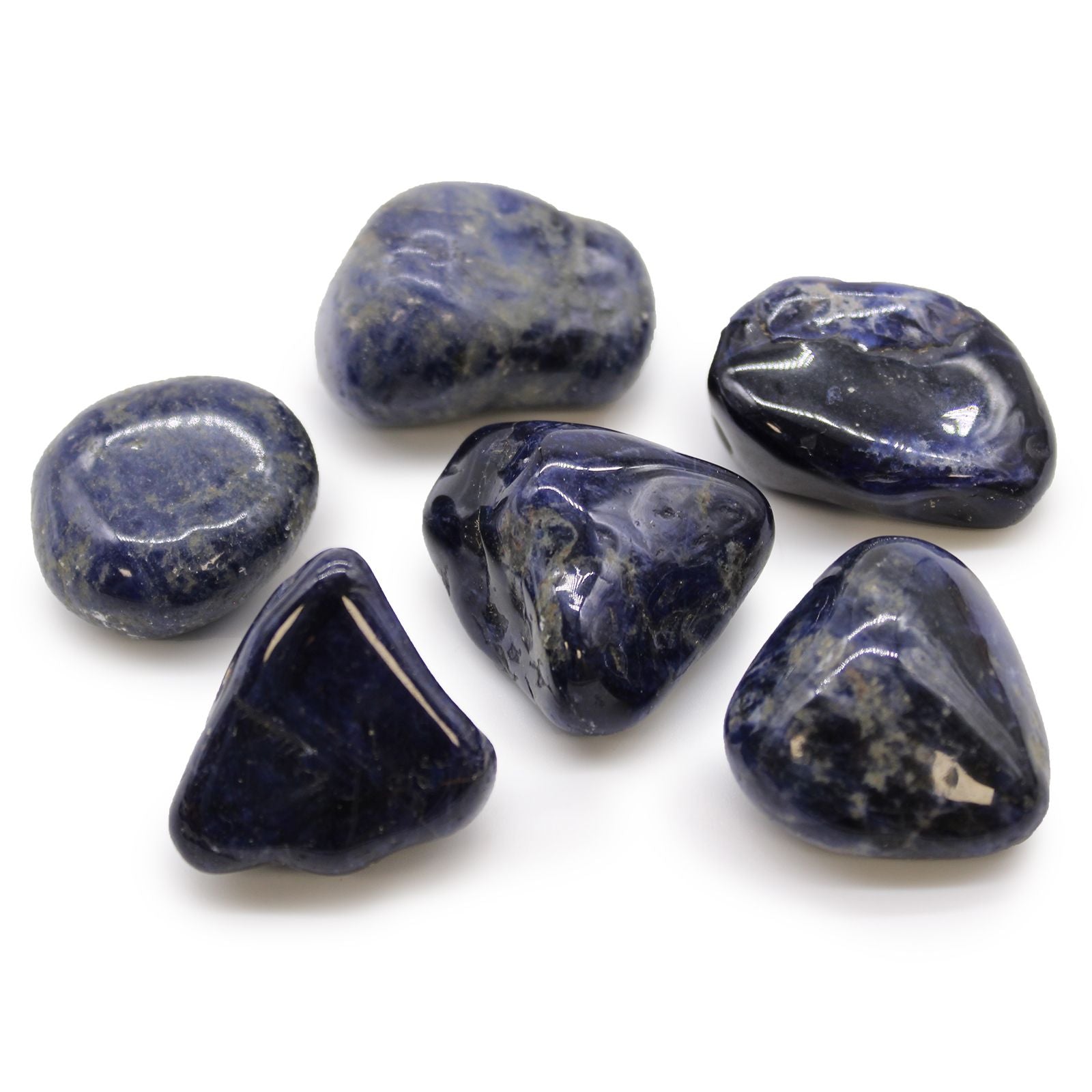 Smooth, large royal blue sodalite tumble stones with characteristic white calcite veining and a polished finish.