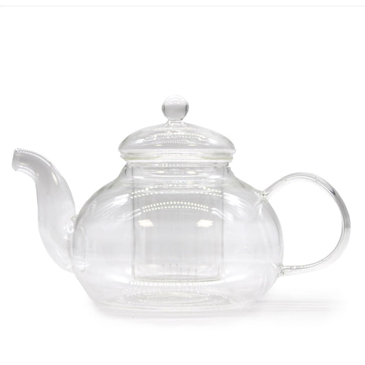 Clear round glass teapot with an internal infuser and a decorative pearl-style lid handle.