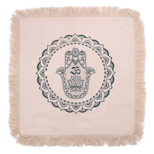 Large green cushion cover featuring an intricate white Hamsa hand and mandala pattern.