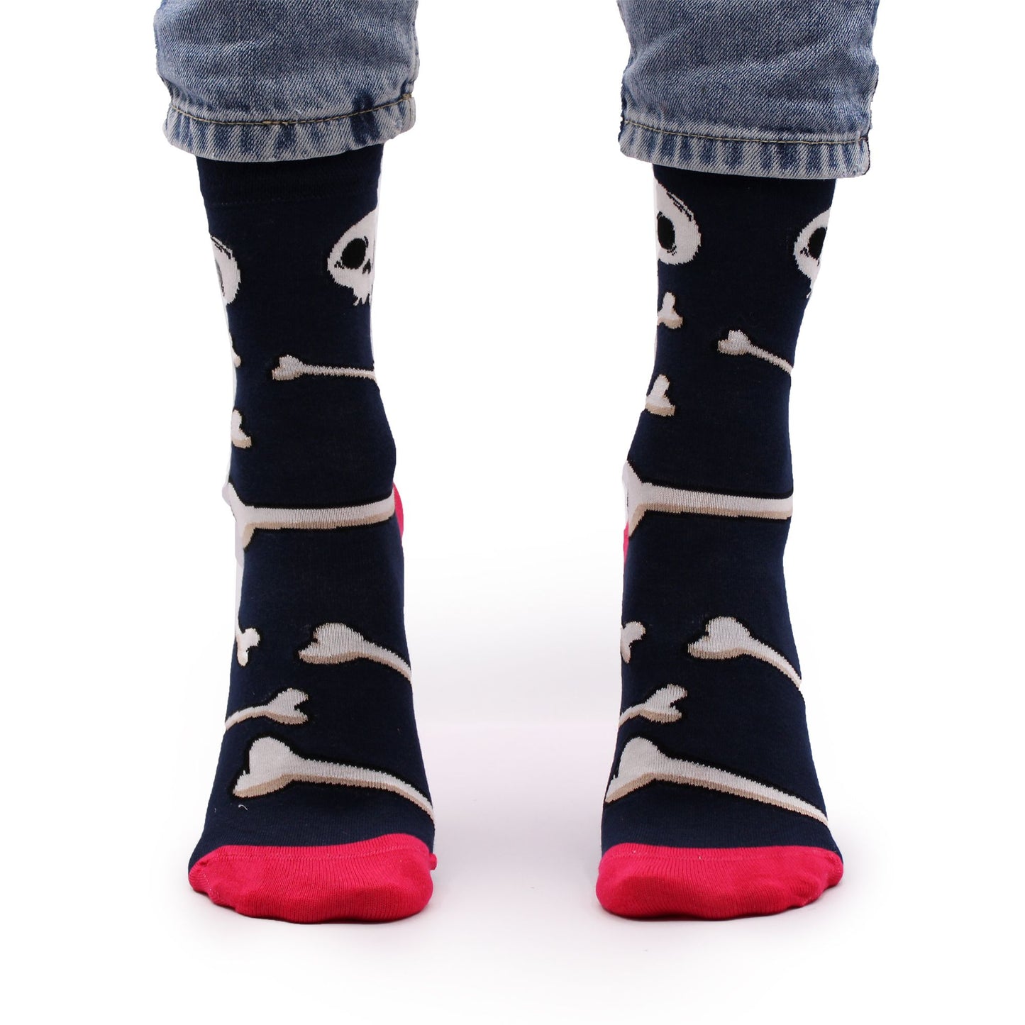 Soft bamboo socks featuring a black and white skulls and bones pattern with a smooth toe seam.