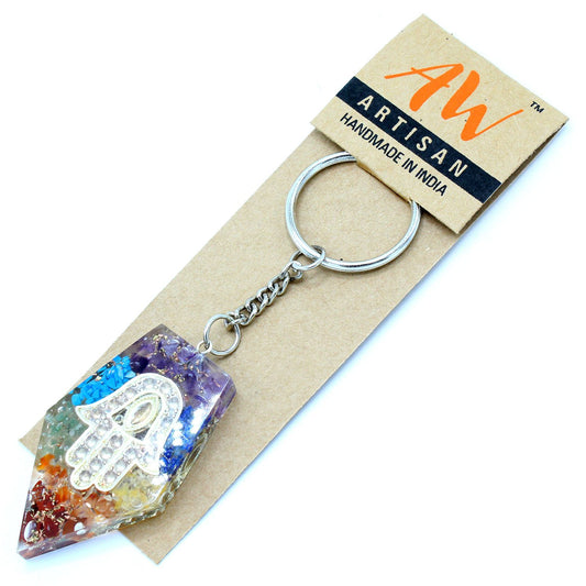 Handcrafted orgonite keyring featuring colorful chakra gemstones and a metallic Hamsa hand symbol embedded in resin.