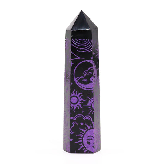 Polished black obsidian crystal point featuring intricate deep purple celestial patterns against a dark background.