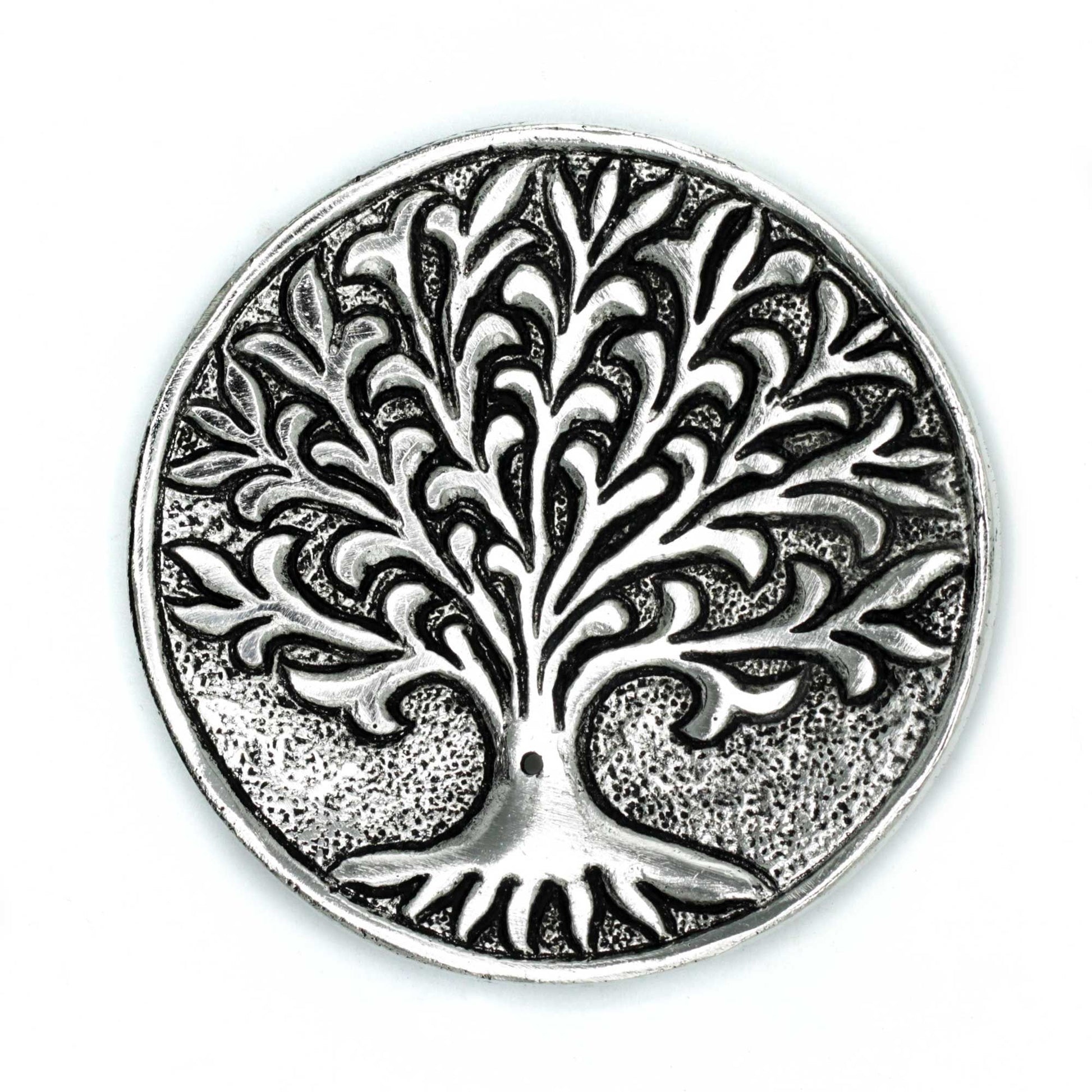 Polished aluminium incense stick holder featuring an intricate Tree of Life silhouette on a round base.