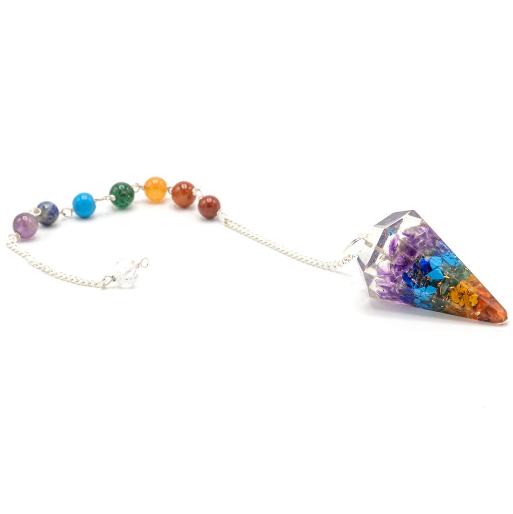 Handcrafted orgonite pendulum featuring vibrant multi-coloured layers representing the seven chakras with a silver chain.