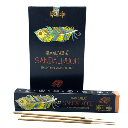 Handcrafted sandalwood incense sticks in traditional tribal-inspired packaging with a serene earthy design.