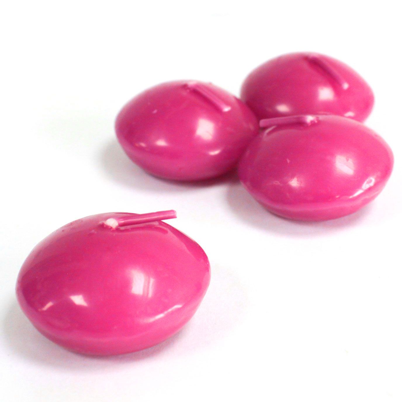 A small round lavender-coloured floating candle designed for water displays.