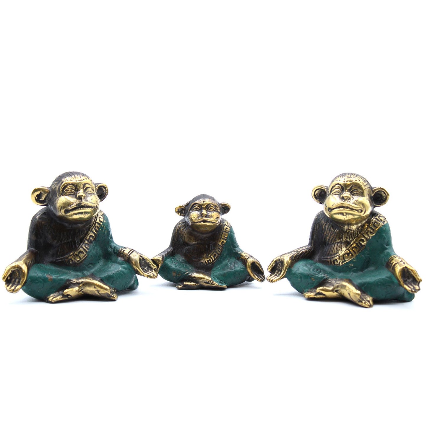 Set of three polished brass monkeys in various yoga poses, showcasing detailed craftsmanship and a serene aesthetic.
