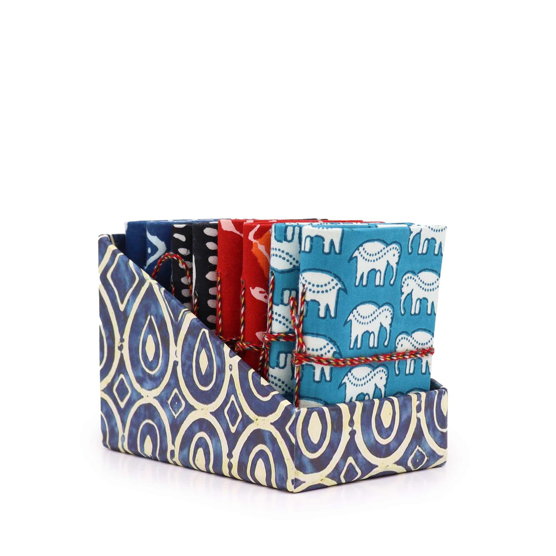 Small colourful cotton bound notebooks featuring various traditional block print patterns and textures.