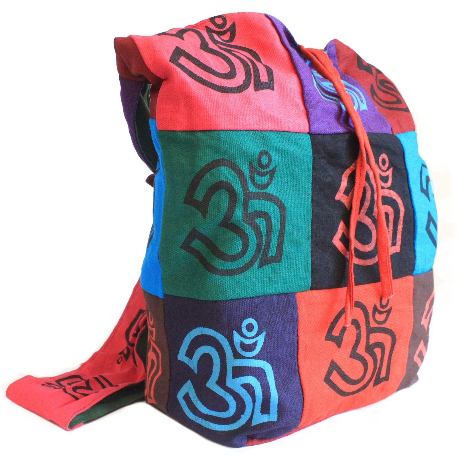 Vibrant multi-coloured cotton patch sling bag featuring an embroidered Om symbol and comfortable shoulder strap.