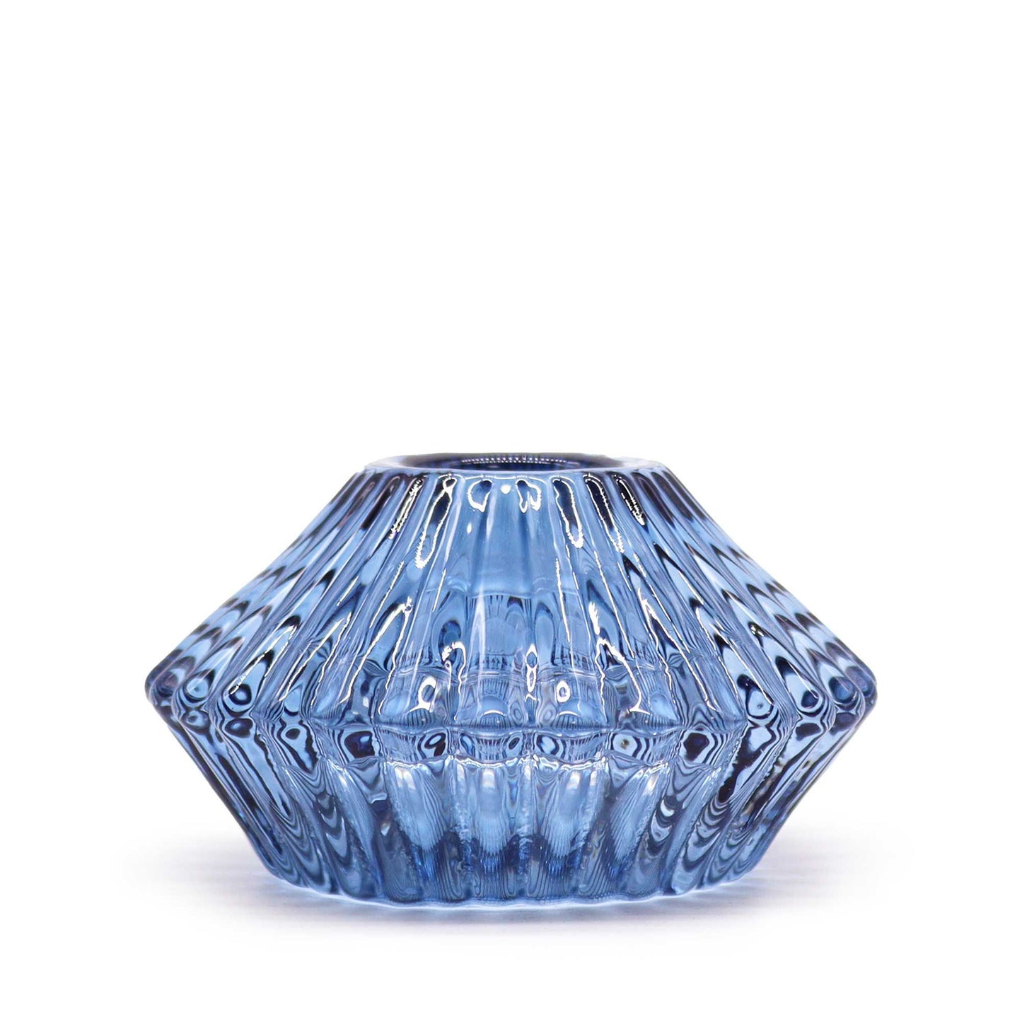 Elegant royal blue glass flower-shaped candle holder designed to hold both dinner candles and tealight candles.