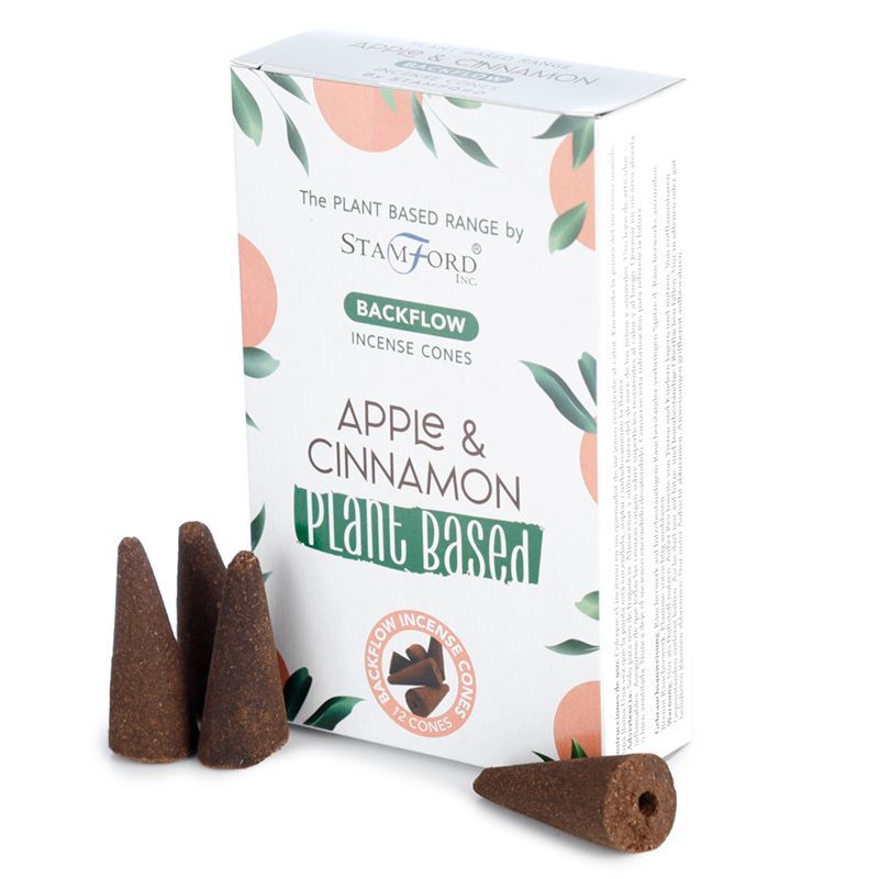Scented backflow incense cones with a smooth surface, designed for downward smoke flow in a decorative burner.