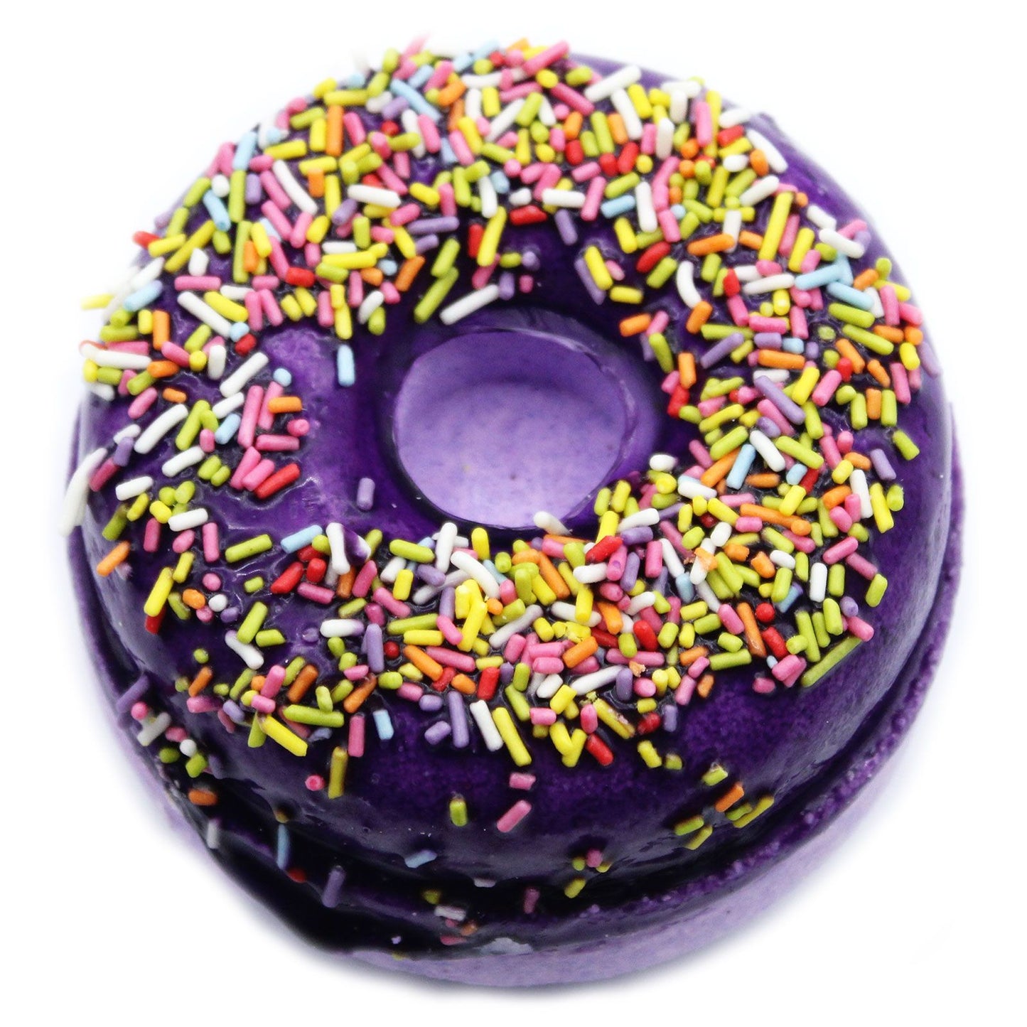Two colourful donut-shaped bath fizzers decorated with soap icing and sprinkles on a plain background.