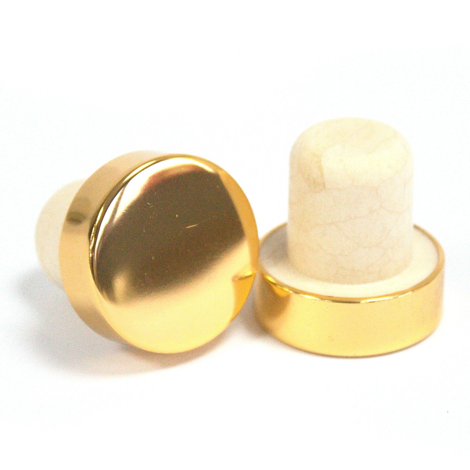 Elegant golden metallic cap for a reed diffuser bottle, featuring a sleek and functional design.