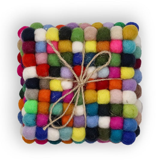 A set of four square coasters handcrafted from small felt balls in various shades of grey.