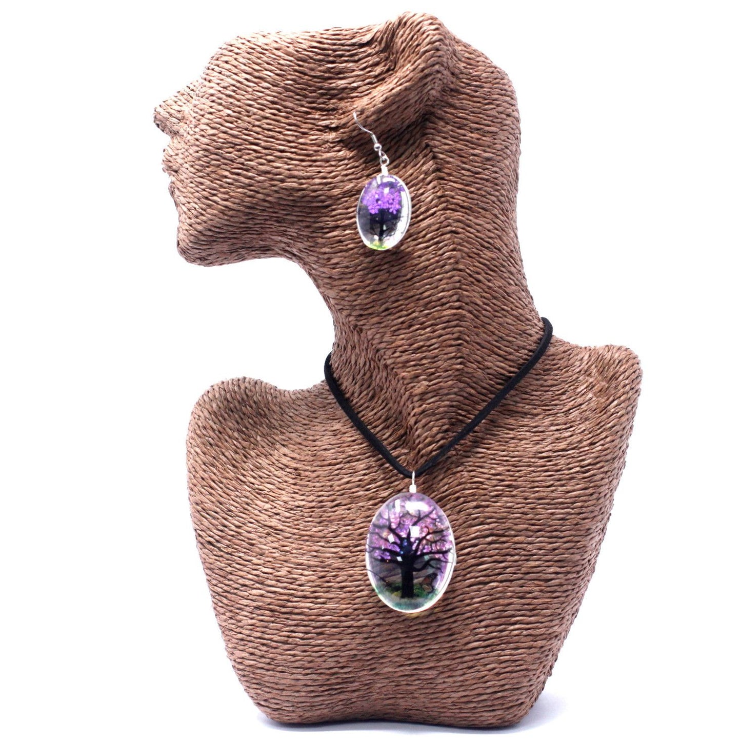 Round glass pendant featuring real purple lavender flowers arranged in a Tree of Life design on a silver-coloured chain.