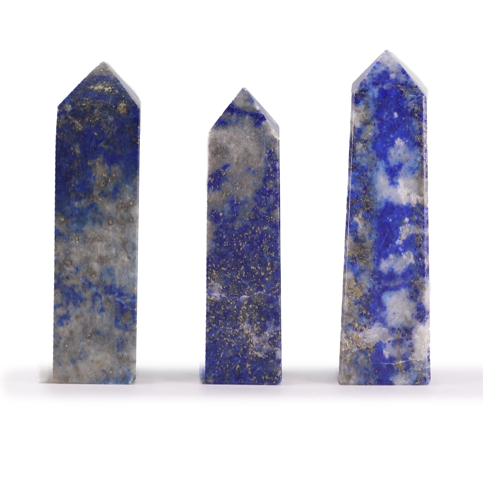 Hand-carved blue Afghan Lapis gemstone obelisk point with a polished finish and natural golden flecks.
