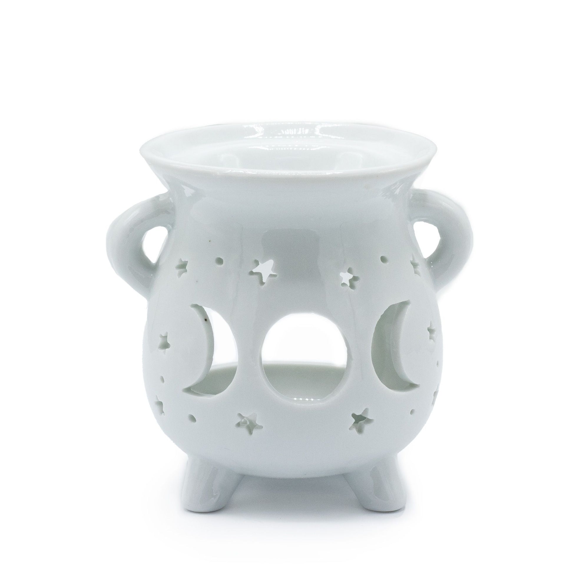 White ceramic cauldron-shaped oil burner featuring cut-out moon phase details on a smooth finish.
