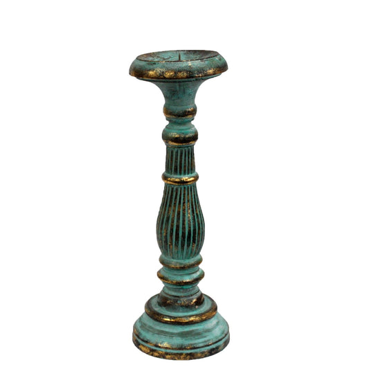 Hand carved ornate wooden candlestick with a distressed turquoise and gold finish for church candles.