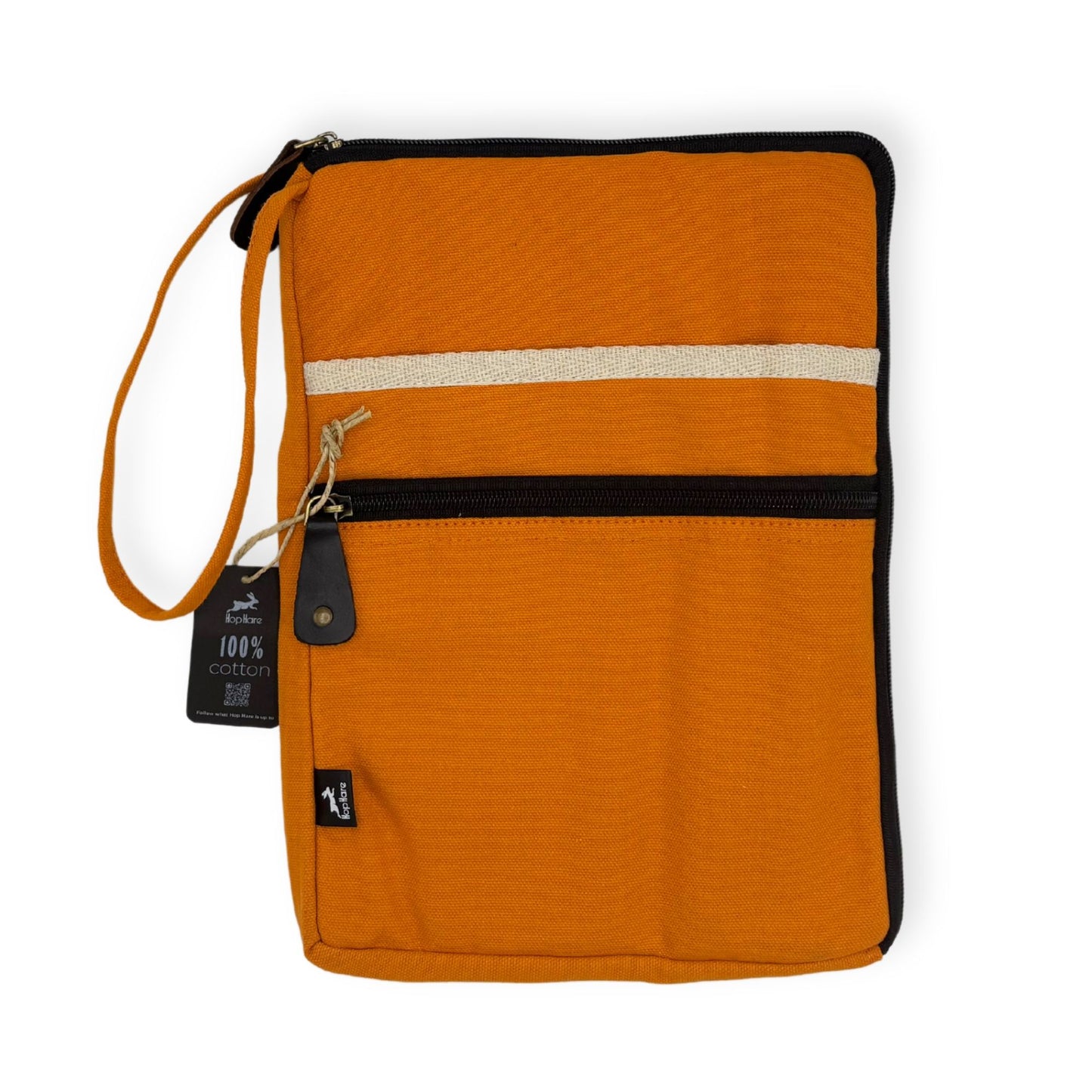 Bright orange canvas laptop and tablet pouch with a slim, minimalist design and quick-access opening.