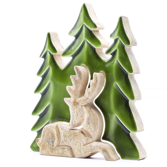 Elegant 3D mango wood ornament of a stag resting under trees with vibrant green enamel accents on a natural wood base.