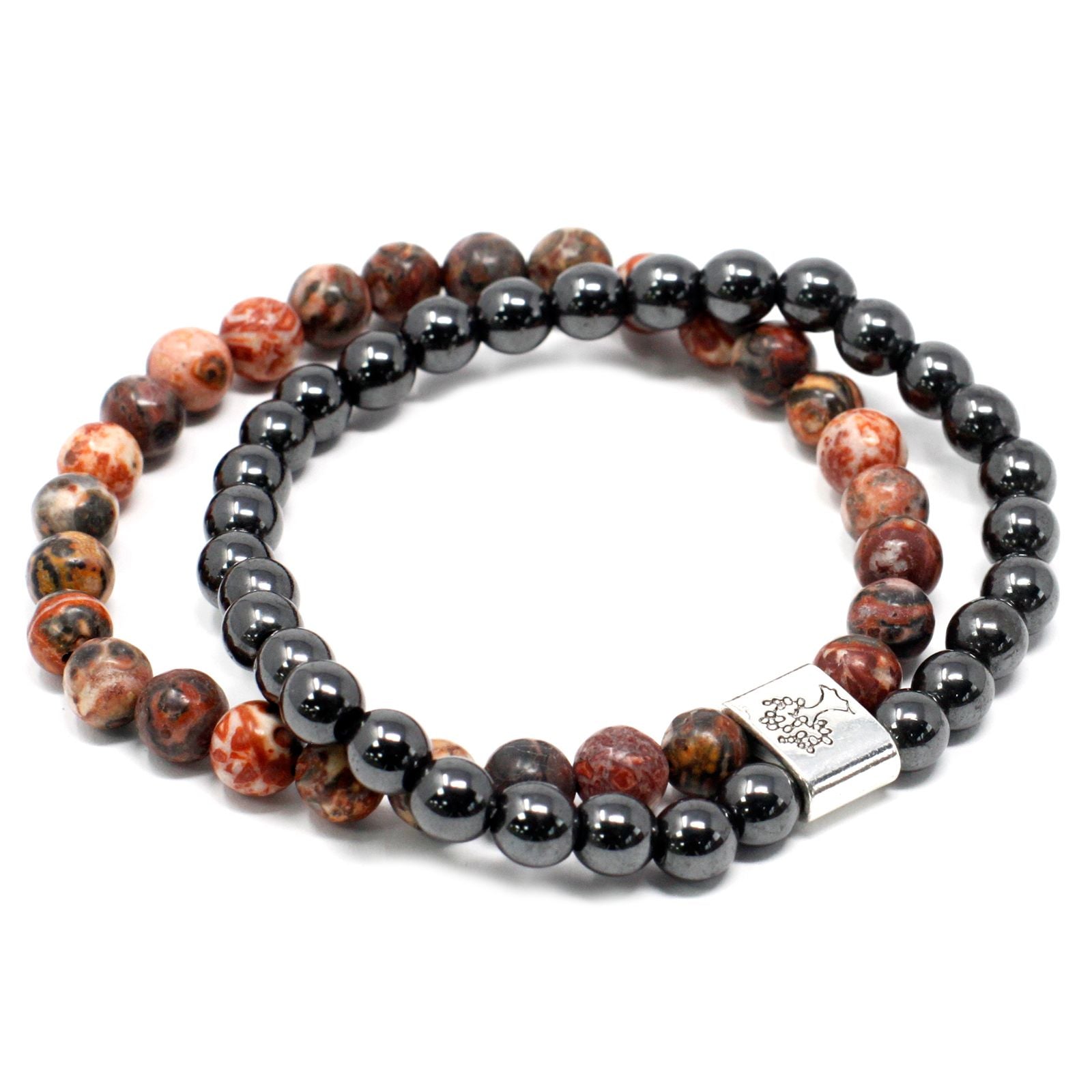 Close up of a leopard skin jasper magnetic gemstone bracelet featuring speckled earth-toned beads on an elasticated cord.