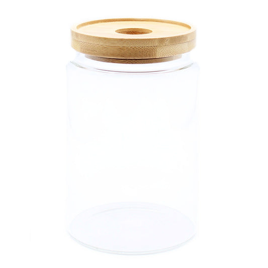 Clear glass storage jar with a sustainable bamboo lid and a 15cm tall cylindrical design.
