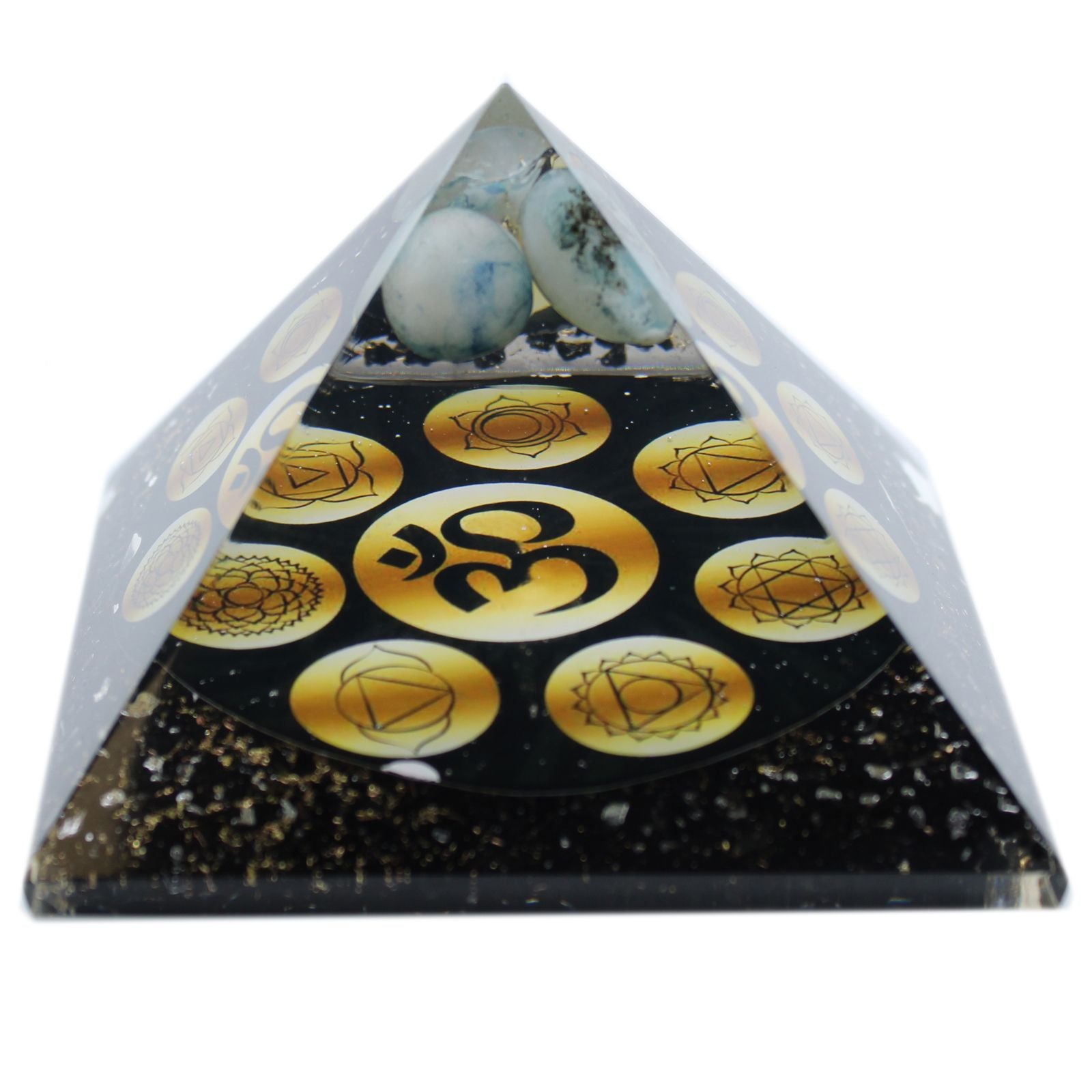 Large 90mm dark resin orgonite pyramid featuring an Om symbol and colourful chakra stones embedded inside.