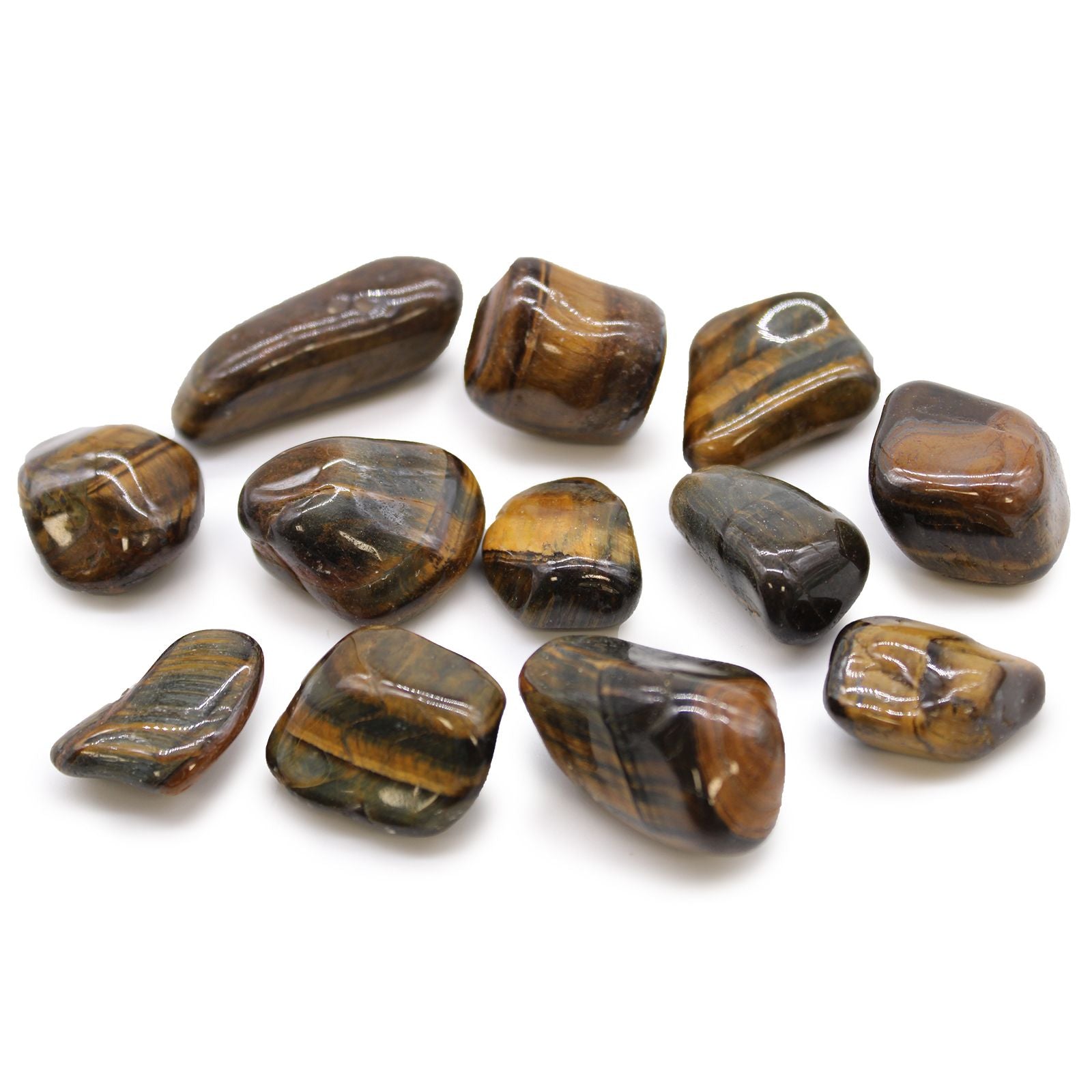 Smooth, polished variegated Tiger's Eye tumble stones showing rich golden-brown bands and unique chatoyant patterns.