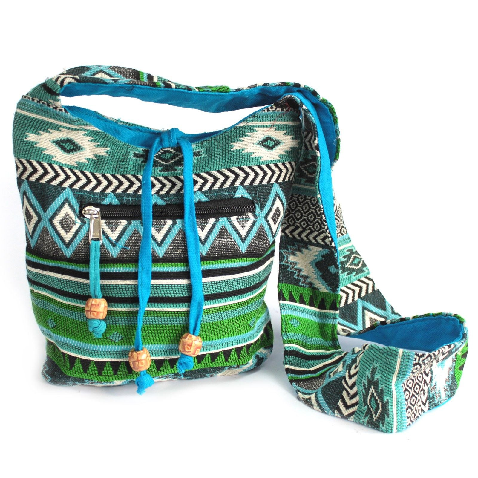 Ethnic teal jacquard fabric sling bag with intricate patterns and a casual bohemian design.