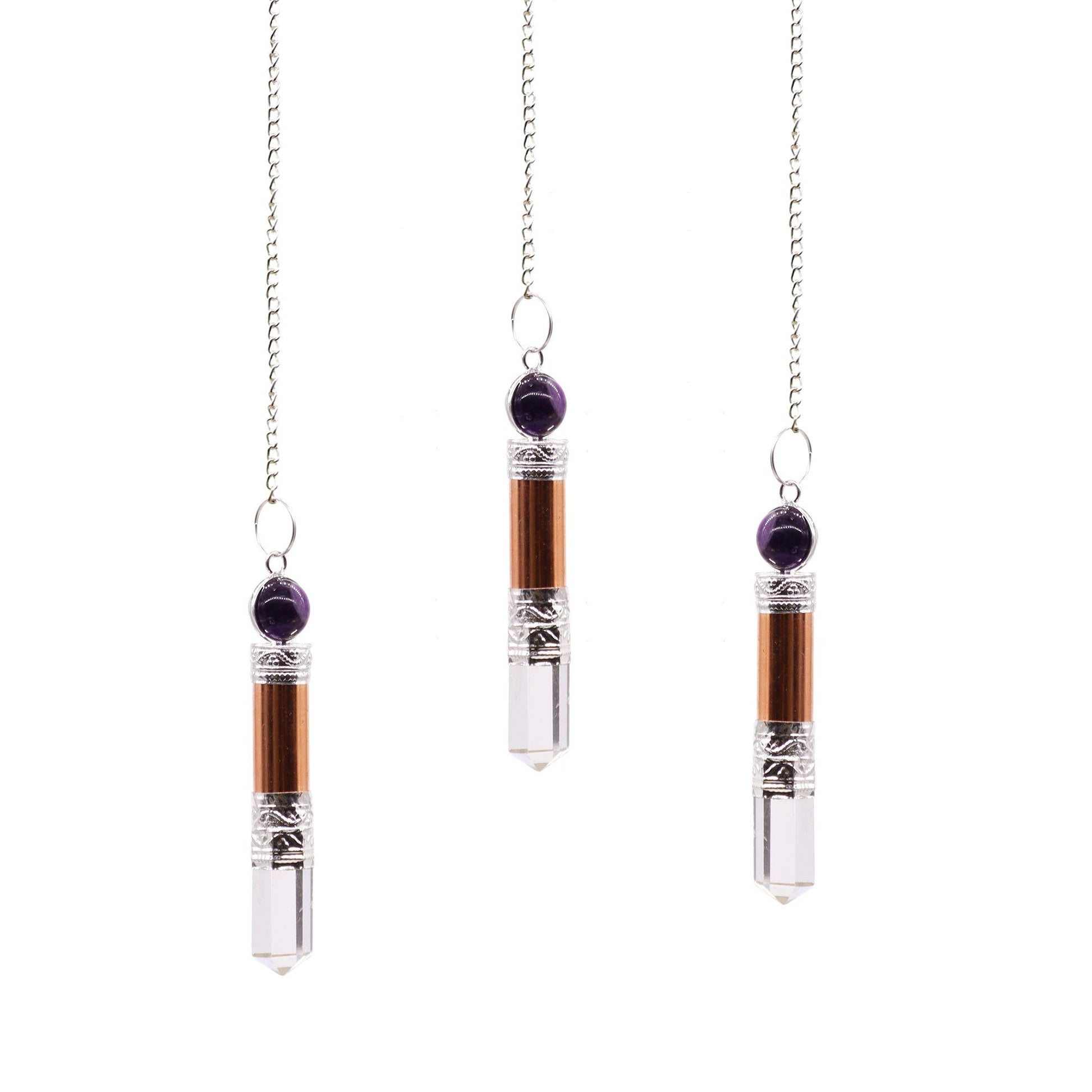Elegant copper pendulum with polished amethyst and clear quartz crystal points on a delicate metal chain.