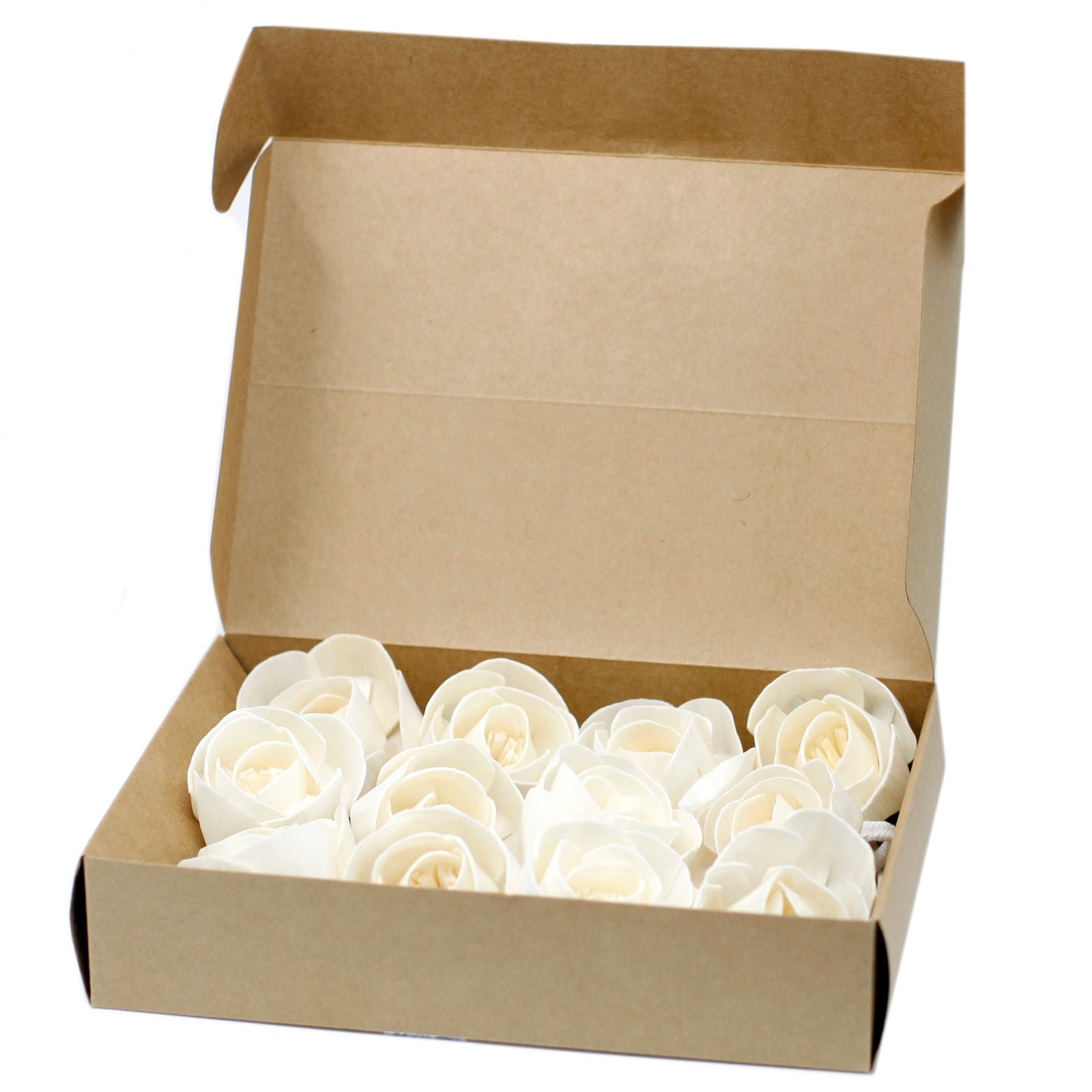 Handcrafted white sola wood rose flower attached to a cotton string for use as a natural aroma diffuser.