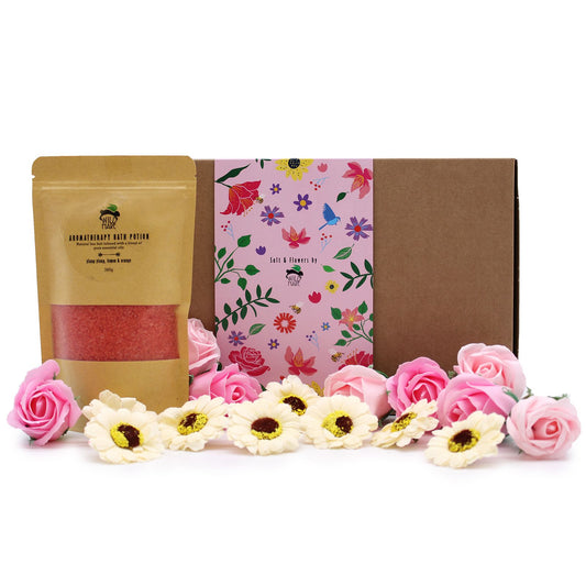 Elegant gift box containing orange bath salts, eight yellow soap sunflowers, and eight pink soap roses.